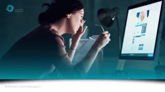 woman, stressed out, in front of a screen.