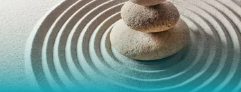 Harmony, stones in sand ripples.